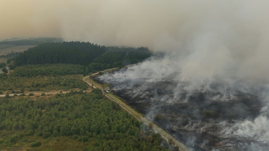 Aerial view of a wildfire burning in the Hautes Fagnes (High Fens) nature reserve in Waimes on August 15, 2026