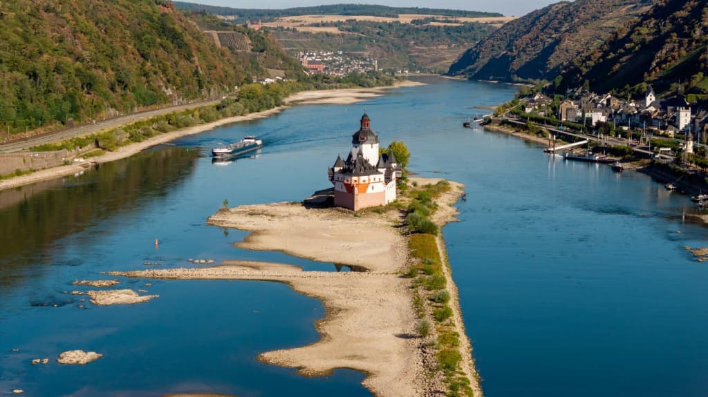 The Rhine has fallen to record low levels, as can be seen from the Pfalzgrafenstein Castle's exposed position