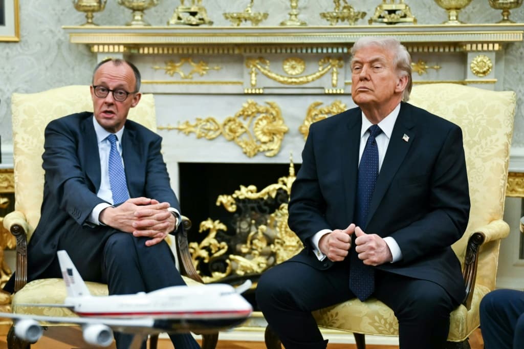 The US leader (R) lashed out at German Chancellor Friedrich Merz (L) threatening to reduce the number of its troops in Germany