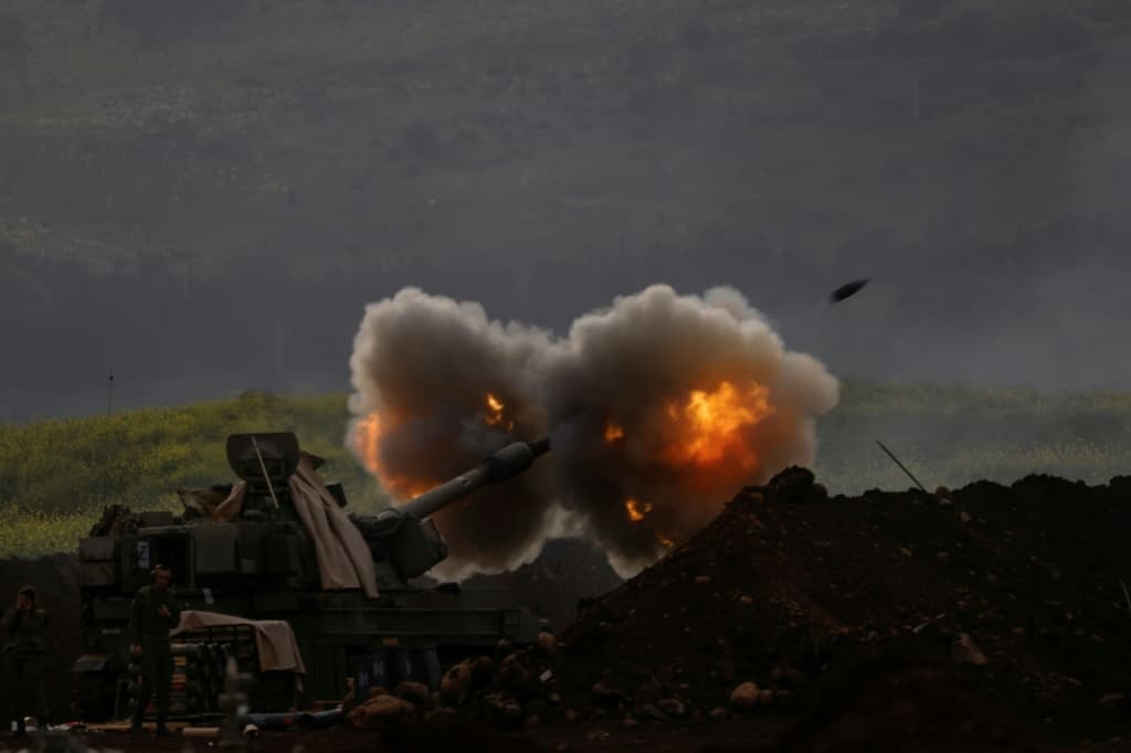 An Israeli artillery in northern Israel fires towards southern Lebanon