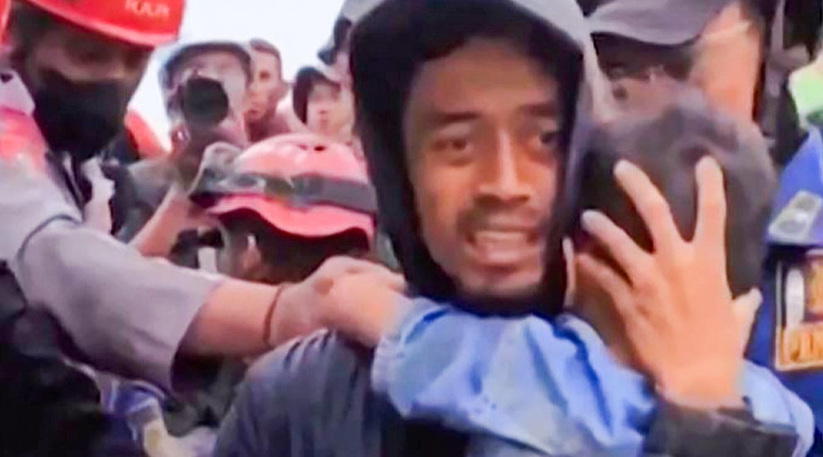 Boy_6_pulled_alive_from_wreckage_of_Indonesia_earthquake_SPACEBAR_Hero_e51048a1e6.jpeg