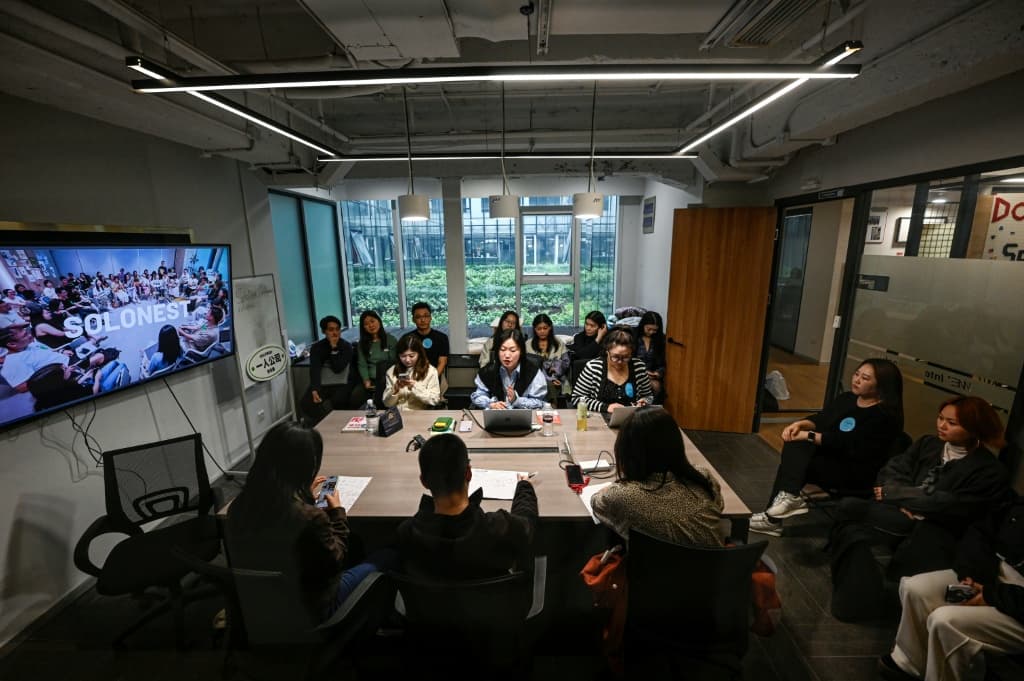 SoloNest founder Karen Dai (centre) sharing her experience with participants during a coffee chat