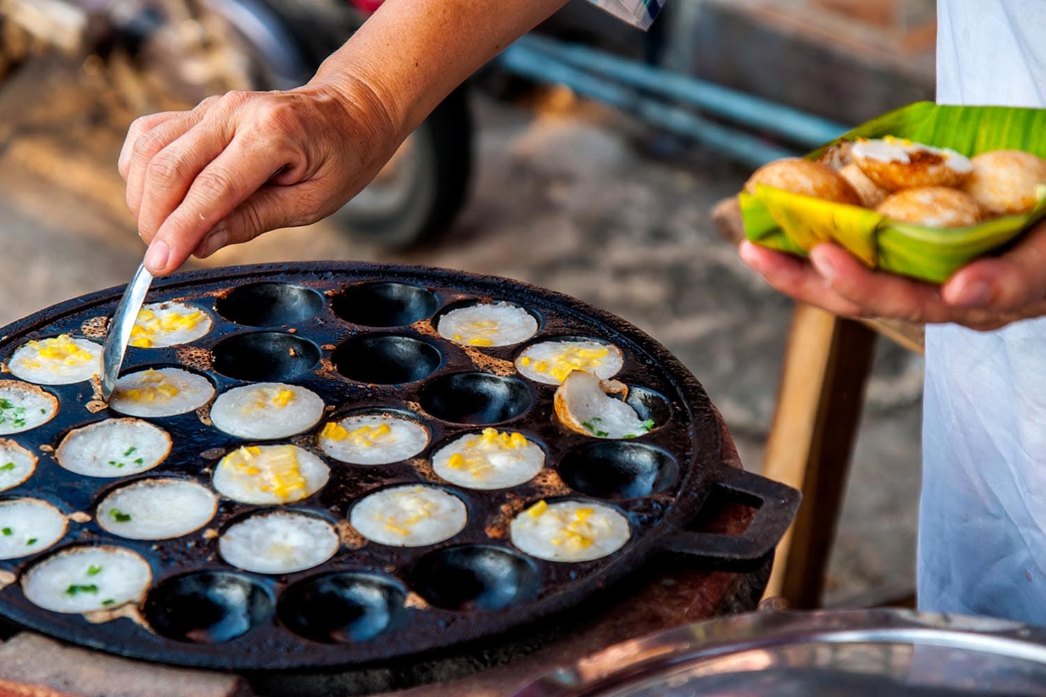 khanom_krok_thai_delight_fourth_best_pancake_in_the_world_by_tasteatlas_SPACEBAR_Hero_59a093dbd5.jpg