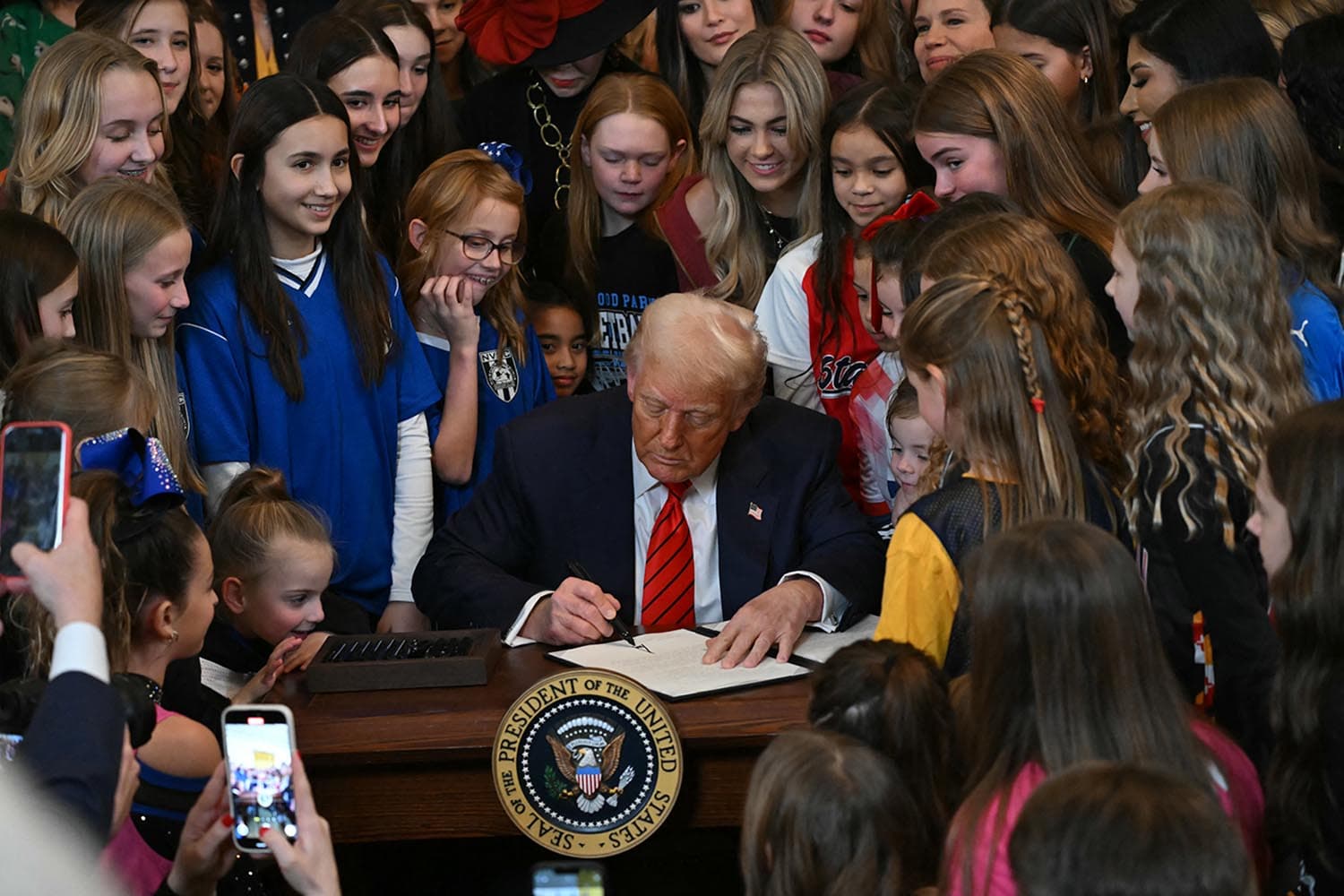trump_signs_executive_order_banning_trans_participation_women_sports_SPACEBAR_Hero_013066d178.jpg