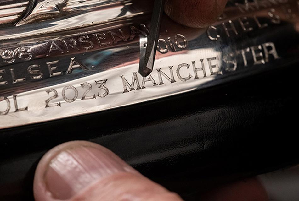 Manchester-engraving-on-trophy-before-the-final-FA-Cup-SPACEBAR-Thumbnail
