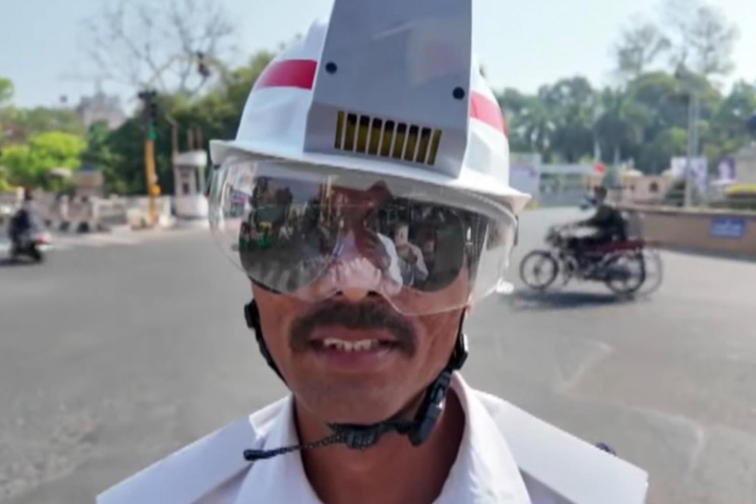 indian-traffic-police-beat-the-heat-with-air-conditioned-helmets-SPACEBAR-Hero.jpg